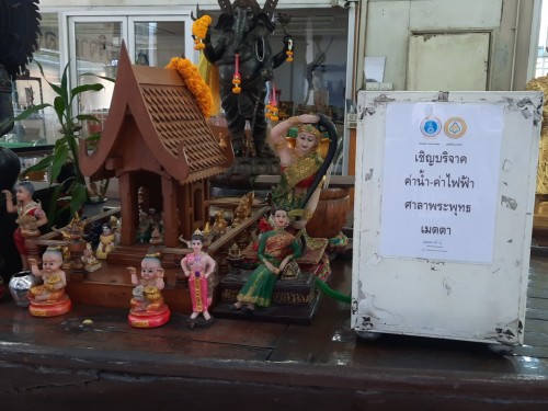 It's not uncommon to find dolls and animal figurines in places of worship and apirit houses through Thailand.