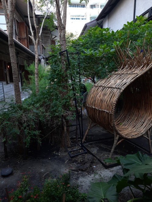 A leafy courtyard in an upscale cafe in Sathorn.