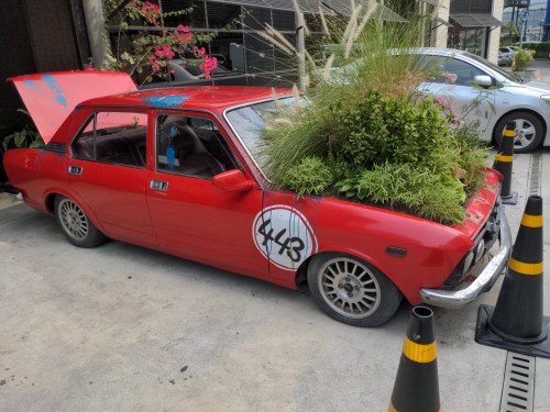 A planter fashioned out of an old BMW