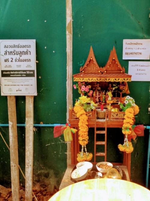 Spirit houses big and small, everywhere in Bangkok.