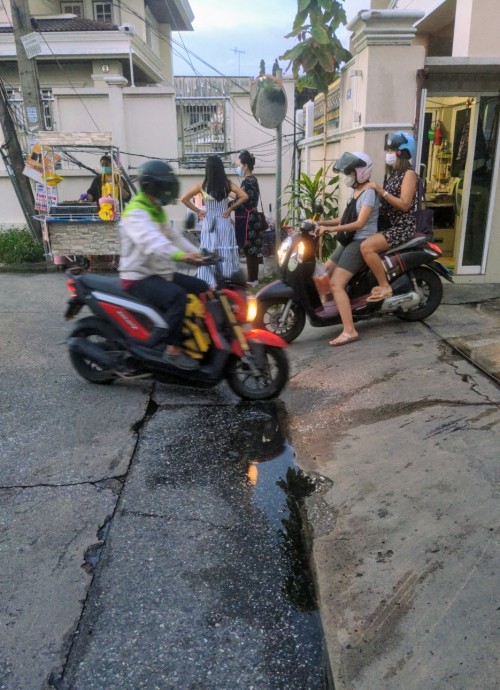 Moto drivers in Bangkok are immune to the laws of physics.