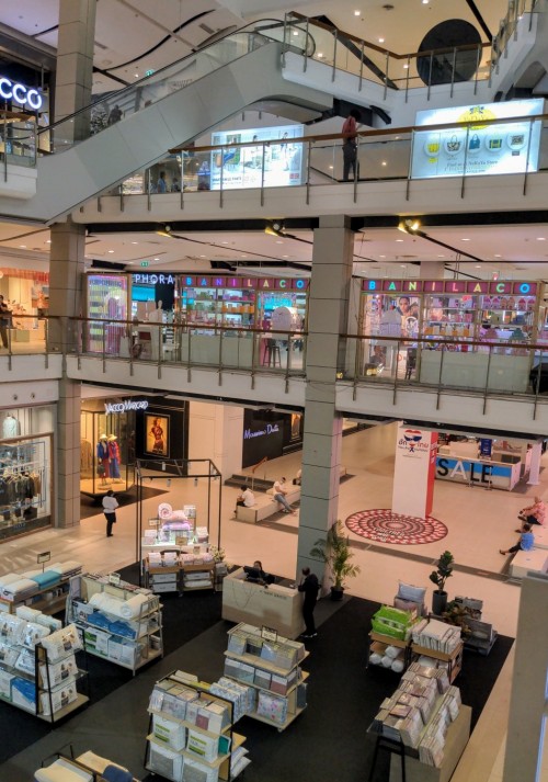 At 5.30pm on a Saturday under lockdown, one of Bangkok's fanciest malls is a desolate  shadow, with only 30% of the normal foot traffic of the pre-pandemic days.