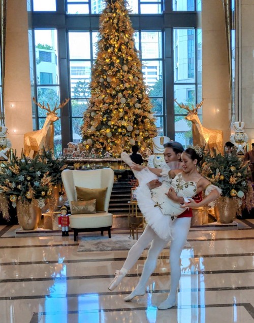 A Christmas ballet in the lobby of a fancy hotel in Bangkok.