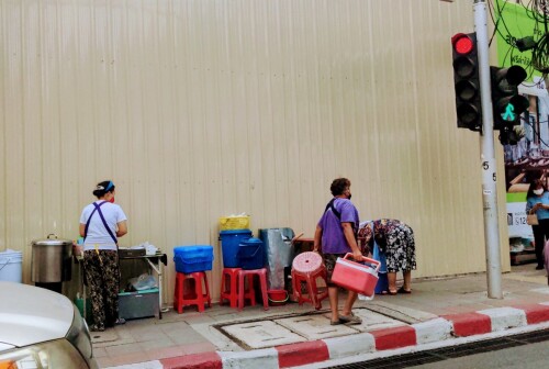 A street food stall setting up for the start of the day.