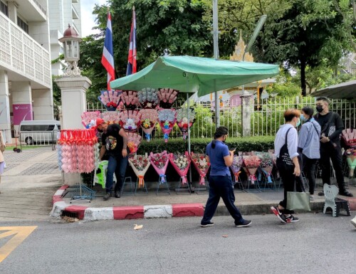 Street vendors outside Chula University, sell flowers, gowns and even tiaras for the graduate's formal ceremony.